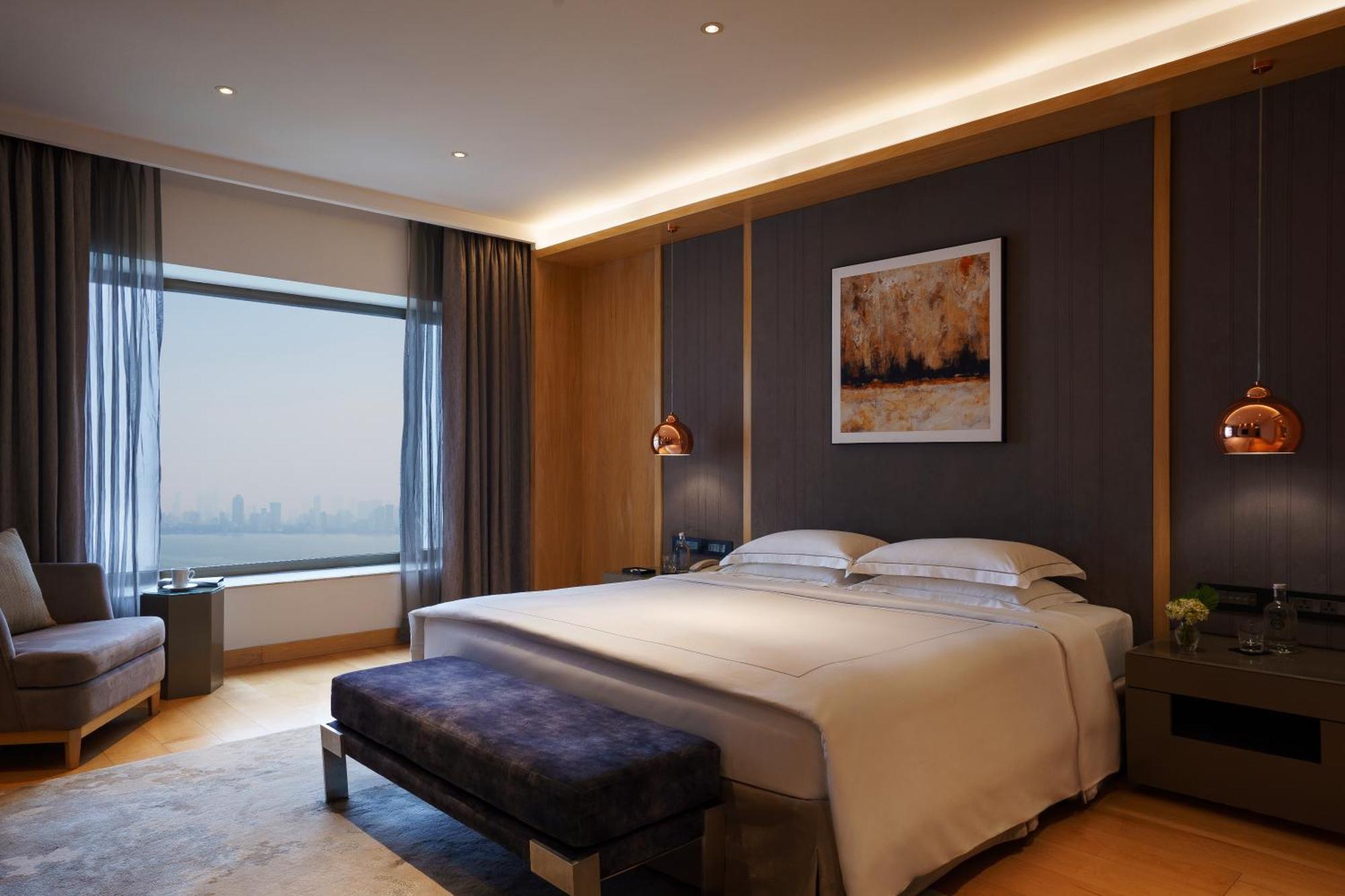 מלון מומביי Taj Lands End מראה חיצוני תמונה A bedroom at the hotel